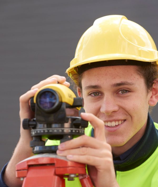 Trade Training Centre student learning surveying